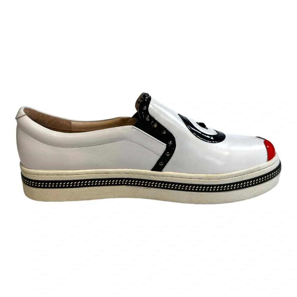 White Leather Slip-On Sneakers with Black Trim and Red Accent